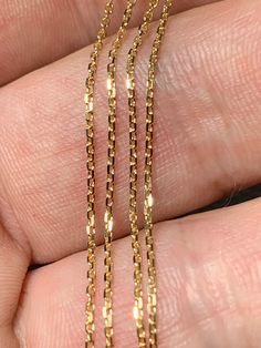 Diamond Forçat link chain 1.5 mm, 40 - 42 - 45 or 50 cm, 18k yellow gold (750/1000th) This chain finished in 18 carat 3N yellow gold is made of a diamond-cut Forçat link and has a lobster clasp. Other diameter can be made on request A great classic of traditional jewelry, the Forçat link is inspired by the convoys of convicts who were tied together with chains. Here, the mesh is diamond-cut or filed and has a shiny effect. Its rectangular rings are faceted to reflect the light optimally. Chain F Traditional Jewelry, Metal Necklaces, Diamond Cut, Necklace Pendant, Colour Palette, Link Chain, Chains Necklace, Lobster Clasp, Gold Diamond