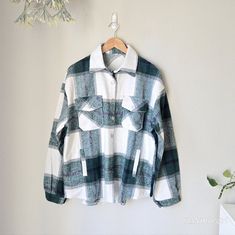 Brand New Unbranded Boutique Green & White Plaid Classic And Versatile, This Plaid Flannel Shirt Jacket In A Mid-Weight Cozy Fabric Is Perfect All Year Round - Light Enough For Summer Evenings And Warm Enough For Fall Days. Button Down With Silver Tone Buttons Front Flap Pockets With Button Closure Slant Hand Pockets Curved High-Low Hem Relaxed Fit Polyester - Brushed Wool Feel Approximate Flat Measurements Medium Pit To Pit 24" Length 30" Large Pit To Pit 25" Length 31" Jacket, Shacket, Shirt J White Casual Shacket For Work, Casual White Shacket For Work, White Shacket With Lapel Collar And Pockets, Casual White Shacket With Button Closure, Casual White Shacket With Buttons, White Long Sleeve Shacket With Snap Buttons, White Collared Shacket With Snap Buttons, White Collared Shacket With Pockets, White Cotton Button-up Shacket