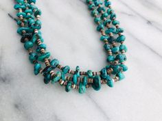 3 Strands of Genuine Heishi and Turquoise Necklace done on traditional threading and no clasp needed. Material: 3 mm, New Mexico turquoise nugget, tiny Heishi (shell beads). Length: 32 inches. Layer with a combo of other necklaces for a hobo chic vibes. (shown in photo) Hobo Chic, Heishi Necklace, Tahitian Pearl Necklace, Chic Vibes, Rose Quartz Necklace, Necklace Brands, Agate Necklace, Tahitian Pearls, Shell Beads