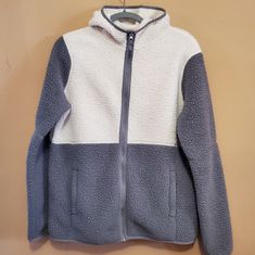 Nwot, Lands' End Colorblock Hooded Sherpa Fleece Jacket In Grey & Cream. (Sold Out Colorway!) Unisex! Size 18/20 Sherpa Fleece & Ripstop Fabric Stretch Binding At Hood & Cuffs To Keep Out The Cold. Pockets Front, Full Zipper (Ykk) Water Repellent Lining Throughout 100% Polyester - Machine Wash Length 26.5" Armpit To Armpit 21.5" Outdoor Fleece Outerwear With Color Block, Outdoor Fleece Color Block Outerwear, Outdoor Color Block Fleece Outerwear, Gray Hooded Fleece Jacket With Fleece Lining, Gray Color Block Winter Outerwear, Winter Gray Color Block Outerwear, Gray Hooded Jacket With Fleece Lining For Cold Weather, Winter Gray Color Block Hoodie, Gray Color Block Hoodie For Winter