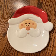 a white plate with a santa claus face on it