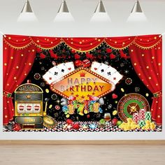 a casino themed birthday party backdrop with slot machines