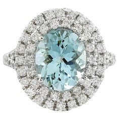 an aqua and white diamond ring