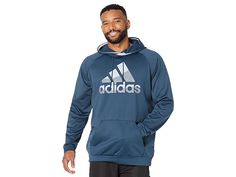 adidas Big Tall Game Go Big Logo Pullover Hoodie - Men's Clothing : Crew Navy/Crew Navy : The primary materials that compose this product contain a minimum of 20 percent recycled content. Get the all-time comfort wearing the adidas Big Tall Game Go Big Logo Pullover Hoodie. Regular fit. Long raglan sleeves and hooded neck with drawstring. Brand name embellishment on the front. Pullover style. Kangaroo pocket on the front. 100% recycled polyester. Machine wash, tumble dry. Imported. Measurements: Casual Hooded Activewear With Adidas Logo, Casual Adidas Activewear For Winter, Adidas Logo Functional Long Sleeve Activewear, Adidas Logo Long Sleeve Activewear, Adidas Long Sleeve Functional Activewear, Functional Long Sleeve Activewear With Adidas Logo, Adidas Logo Long Sleeve Activewear For Sports, Sports Hoodie With Three Stripes, Adidas Logo Hoodie For Sports Athleisure