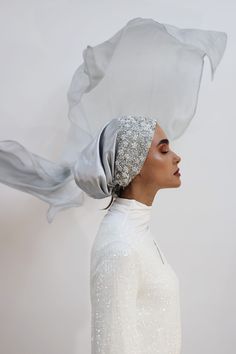 Gorgeous Embroidered Handmade Silver Turban is made with care and love and paired with a 100% Pure Soft Silk Shawl (28"x 72") or a Tulle Shawl (27"x72") for a more dramatic glimpse. You have the option to choose the look you’re looking for. This Silver Glow Set is perfect for an extremely elegant and royal look on your special occasions. Whether it’s for your wedding or engagement party it will add the wow factor to your look. Even if you decided to wear it as a bridesmaid or just for attending Hijab Magnets, Wedding Turban, Tulle Shawl, Bride Hijab, Hijab Veil, Gold Glow, Muslim Brides, Head Dress, Royal Look