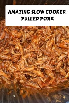 pulled pork cooking in the slow cooker with text overlay reading amazing slow cooker pulled pork