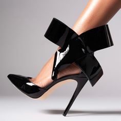 Elevate your style with these Black Pointed Toe Stiletto Heel Pumps. Featuring an ankle strap and bow detail, these shoes are the perfect blend of sophistication and charm. Material: Patent leather Color: Black Heel Type: Stiletto heel Heel height: 4.72" / 120 mm approx Product measurements were taken using size 8. Please note that measurements may vary by size. Toe: Pointed toe Bow embellishment Ankle strap design makes it easier to wear on Handcrafted US sizing. Fits true to size. Black Stiletto Heels, Bow Pumps, Pumps Heels Stilettos, Black Stilettos, Bow Sandals, Bow Heels, Bow Shoes, Strap Pumps, Fabulous Shoes