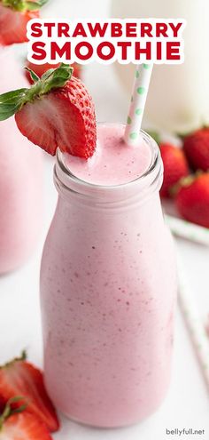 strawberry smoothie in a mason jar with strawberries on the top and text overlay