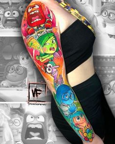 a woman's arm with cartoon characters on it