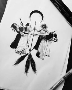 an ink drawing of three witches on paper