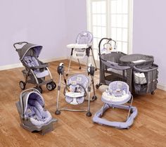 a baby's room with several different types of strollers and toys on the floor