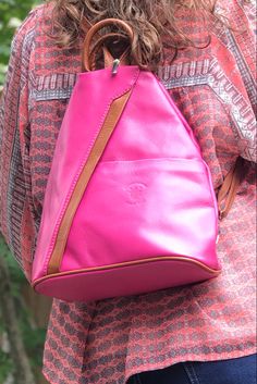 Super stylish and functional - can accommodate smaller water bottle, wallet, cell phone and small book. The small outside and inside zip wall pockets are great for keys and lip gloss. A variety of colors available. #passportholder #smallbackpackpurse #smallpursesforsale #womensstyle #stylishtravel #handsfree #italianleatherhandbags #italianleatherpurses #womenbackpack #giftforher #giftforher #valentinesdaygift #pinkbag Leather Backpack With Cell Phone Pocket For On-the-go, Trendy Leather Backpack With Cell Phone Pocket, Pink Leather Backpack For Travel, Pink Leather Travel Backpack With Removable Pouch, Pink Leather Backpack For Everyday Use, Leather Backpack With Cell Phone Pocket For School, Pink Leather Travel Backpack With Zipper, Pink Leather Backpack With Removable Pouch For Everyday, Pink Leather Backpack With Zipper