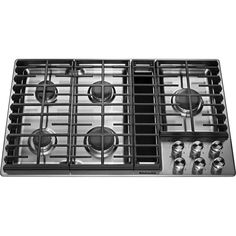 a gas stove with four burners and knobs