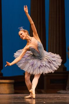 a ballerina in a tutu and leotard