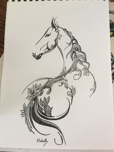 a drawing of a horse's head with swirls and leaves on it, in black ink