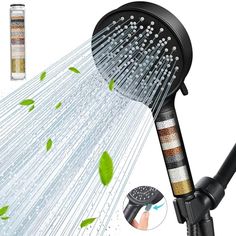 the shower head is spraying water from it's sprinkles and leaves