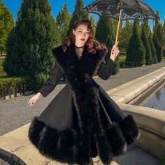 This le palais vintage heavy luxury fur woolen big skirt black coat from Deks is the perfect piece to turn heads this fall and autumn. Crafted from elegant, sophisticated, classy, and chic materials, this stylish coat offers a luxurious feel with a hint of vintage allure. Make a statement with this head turning piece that brings a heightened sense of style to your wardrobe. Big Skirt, Fur Coat Outfit, Big Skirts, Winter Fashion Outfits Casual, Elegant Sophisticated, Stylish Coat, Seductive Clothes, Vintage Models, Winter Outfits For Work