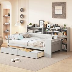 a bedroom with a bed, couch and bookcase in it's center area