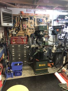 a garage filled with lots of tools and equipment