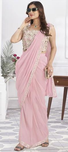 Pink and Majenta color Readymade Saree in Georgette fabric with Embroidered, Sequence, Thread work Pink Embroidered Pre-draped Saree For Wedding, Embroidered Pink Pre-draped Saree For Wedding, Pink Semi-stitched Traditional Wear For Ceremony, Pink Embroidered Fabric For Wedding With Traditional Drape, Pink Traditional Wear With Resham Embroidery For Ceremony, Pink Dupatta For Diwali Ceremony, Pink Saree With Zari Work For Ceremonies, Pink Traditional Wear With Pallu For Ceremony, Elegant Saree With Pallu For Ceremony