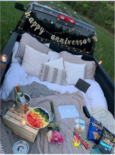 an open truck bed filled with food and drinks