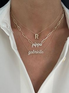 This gorgeous necklace features the name of your choice in a script font set in diamonds. Price is based on the number of letters in the name. Example is shown in all lowercase letters. First letter uppercase is available also. Available in 14K Yellow, White or Rose Gold Up to 10 letters only Letter Height Measurement: Approx. 4mm to 8mm (varies slightly per letter) FINAL SALE Luxury Personalized Yellow Gold Initial Necklace, Name Necklace Aesthetic, Elegant Names, Height Measurement, Necklace Stack, Gold Letter