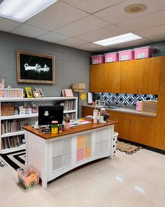 an office with lots of books on the shelves