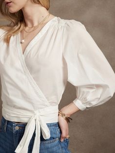 Embroidered Wrap Top | Banana Republic Factory White Blouse With Tie Sleeves For Daywear, Long Sleeve Cotton Blouse With Tie Waist, Long Sleeve Tops With Tie Waist For Daywear, White Blouse With Tie Sleeves For Brunch, Cotton Blouse With Tie Waist And Long Sleeves, Puff Sleeve Tops With Tie Sleeves For Brunch, V-neck Blouse With Tie Sleeves For Work, Elegant Blouse With Tie Sleeves For Brunch, Workwear Puff Sleeve Top With Tie Sleeves