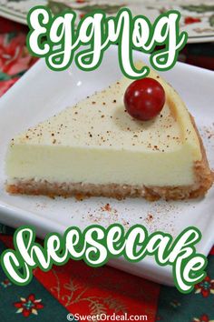 a piece of cheesecake with a cherry on top and the words enjoy cheesecake above it