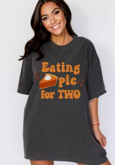 This Thanksgiving pregnancy announcement shirt is a super cute and fun way to reveal your new baby to loved ones this holiday season! This soft and cozy Comfort Colors tee is a perfect fall pregnancy t-shirt for a mom to be to wear while eating some yummy pie!  ♡STYLE Say hello to your new favorite t-shirt! All of our shirts are made with the highest quality materials and are super soft and cozy! -Comfort Colors tees are made with the most expensive dyeing process, reducing shrinking up to 99% - Graphic Print Tops For Birthday In Fall, Fall Birthday Crew Neck Tops, Fall Crew Neck Birthday T-shirt, Crew Neck Birthday T-shirt For Fall, Cute Fall Birthday Tops, Baby Announcement Fall, Thanksgiving Pregnancy Shirt, Thanksgiving Baby Announcement, Yummy Pie