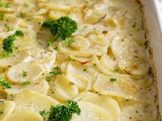 a casserole dish filled with pasta and broccoli