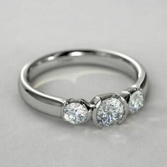 three stone diamond ring in white gold