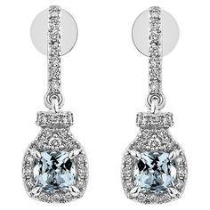 This collection features an array of Aquamarines with an icy blue hue that is as cool as it gets! Accented with Diamonds these Drop Earrings are made in White gold and present a classic yet elegant look. Aquamarine Drop Earring in 18Karat white Gold with White Diamond. Aquamarine: 1.026 carat, 5X5mm size, Cushion shape. White Diamond: 0.338 carat, 1.20mm size, round shape, G color, VS clarity. White Diamond: 0.026 carat, 1.50mm size, round shape, G color, VS clarity Gold: 3.832g, 18Karat white G Luxury Wedding White Topaz Diamond Earrings, Lux Jewelry, Luxe Jewelry, Butterfly Pin, Icy Blue, Naha, Aqua Marine, Drop Earring, Blue Hues