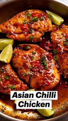 chicken with chili sauce and limes in a pan