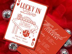 a red and white wedding card with the words lucky in love on it next to disco balls