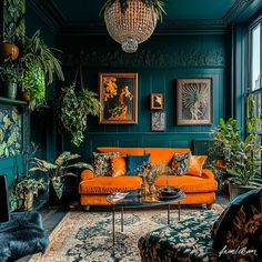 a living room filled with furniture and lots of plants