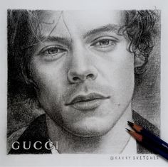 a pencil drawing of a man with curly hair