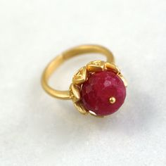 A stunning and luminous 12mm raspberry red ruby stone is set into a 22k gold over sterling vermeil setting. This stone absolutely glows from every single angle. The size is fully adjustable on the very comfortable band. An absolute one and only fine gemstone ring. Raspberry Red, Cabochon Ring, Ruby Stone, Red Ruby, Fringe Earrings, Saint Louis, 22k Gold, Gemstone Ring, One And Only