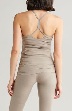 Shirred sides flatter a growing baby bump in this quick-drying racerback tank cut from buttery-soft fabric for comfort in and out of the gym. 23 1/2" length (size Medium) Scoop neck Built-in shelf bra 87% polyester, 13% spandex Machine wash, tumble dry Imported Athleisure Activewear With Built-in Bra And Scoop Neck, Yoga Activewear With Built-in Bra And Scoop Neck, Sports Tops With Built-in Bra And Scoop Back, Sporty Tank Top With Built-in Bra For Yoga, Yoga Tank Top With Built-in Bra And 4-way Stretch, Athleisure Tank Top With Built-in Bra, Racerback Top With Built-in Bra For Workout, Racerback Tank Top With Built-in Bra And 4-way Stretch, Supportive Tank Top With Built-in Bra For Training