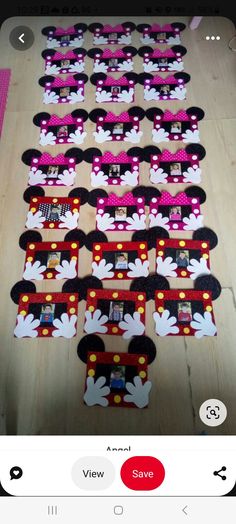 the mickey mouse ears are cut out and ready to be placed on top of each other