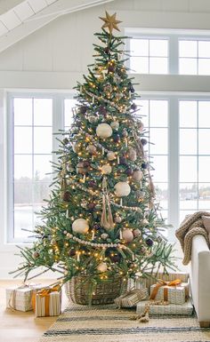 a decorated christmas tree in a living room