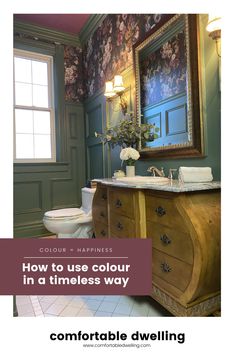 a bathroom with green walls and floral wallpaper on the walls is featured in an article titled how to use color in a timerless way