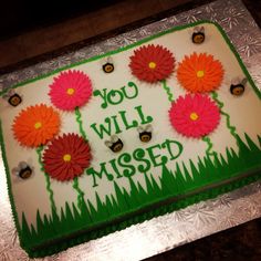 a sheet cake decorated with flowers and the words you will missed