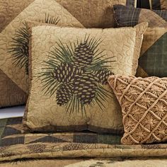 the pillows are made with pine cones on them