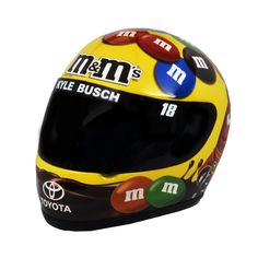 a yellow helmet with m & m's stickers on the front and side