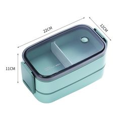 an image of a blue lunch box with the lid open and measurements in front of it