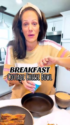 a woman is making breakfast with cottage cheese bowl