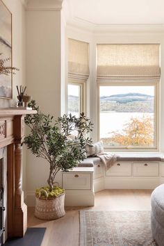 a living room filled with furniture and a window