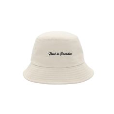 Our Signature Paradise bucket hat is lightweight with a wide brim that helps shield you from the sun's rays. Black embroidered signature logos add elegant contrast on neutral tone. Product Details Signature word mark logo on one side Paradise logo on the other side Fabric is lightweight, four-way stretch, sweat-wicking, and quick-drying Adjustable headband for smaller fit Size Guide Model is wearing size XL Material and Care ▪️ 95% Cotton ▪️ 5% Rayon ▪️ Hand wash cold only ▪️ Do not bleach ▪️ La Casual Wide Brim Bucket Hat With Embroidered Logo, Beige Hat With Embroidered Logo And Short Brim, Beige Summer Hats With Embroidered Logo, Beige Bucket Hat With Uv Protection And Flat Brim, Adjustable Flat Brim Bucket Hat With Embroidered Logo, Adjustable Bucket Hat With Embroidered Logo And Flat Brim, Summer Outdoor Bucket Hat With Embroidered Logo, Adjustable Wide Brim Bucket Hat With Embroidered Logo, Adjustable Sun Hat With Embroidered Logo And Curved Brim