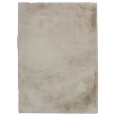 a white rug on a white background